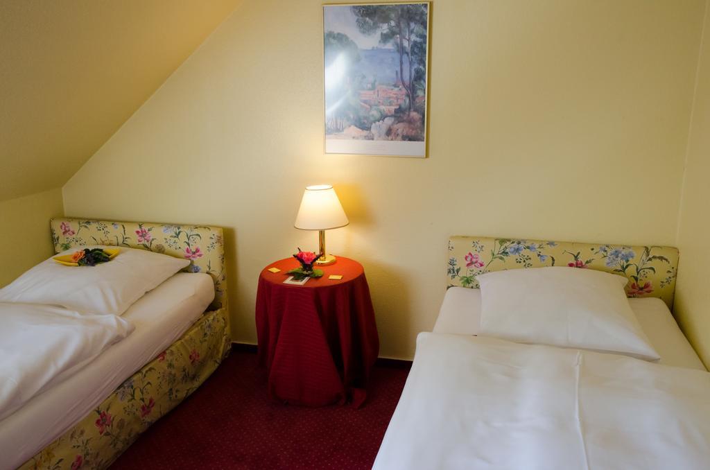Hotel Gutshof Busch Sarstedt Værelse billede
